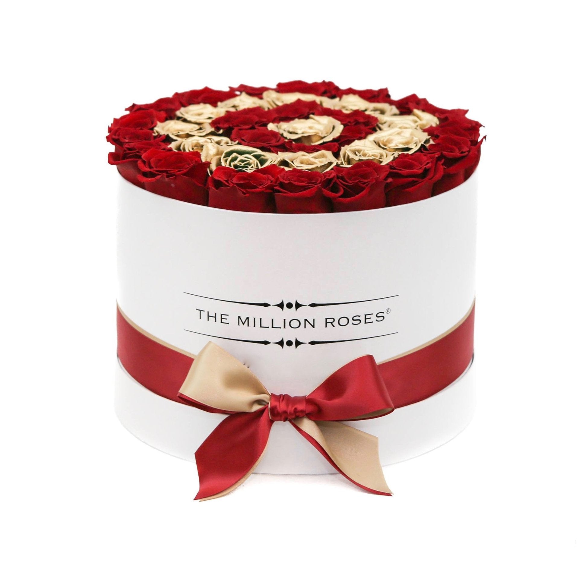 Trandafiri roșii și aurii in cutie albă medie
